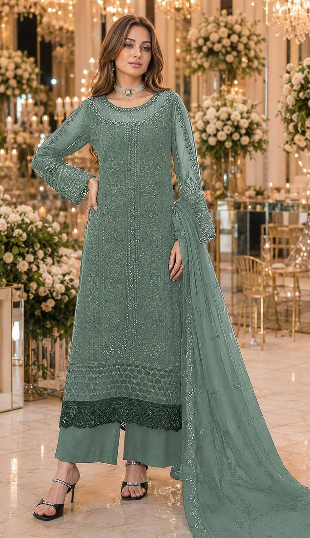 Sea green chiffon suit with thread embroidery & sequin work
