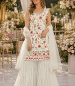 White georgette suit with embroidered multi work