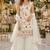 White georgette suit with embroidered multi work