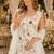 White georgette suit with embroidered multi work