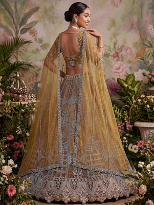 Dazzling Golden Multi Thread Work Net Reception Wear Lehenga Choli 3