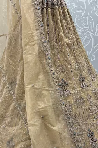Royal Beige Zari Work Net Wedding Wear Lehenga Choli With Dupatta