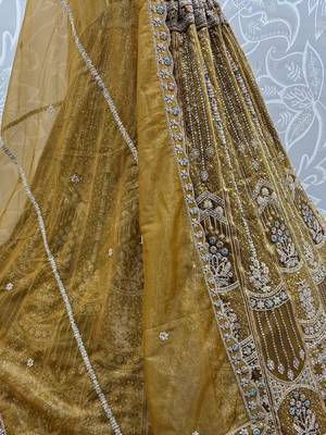 Dazzling Golden Multi Thread Work Net Reception Wear Lehenga Choli 7