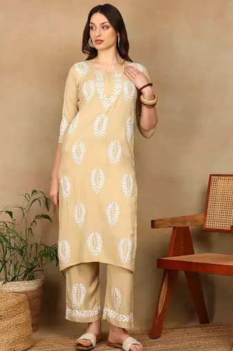 Women beige rayon ethnic motifs embroidered a-line chikankari kurta & palazzo set