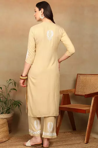 Women beige rayon ethnic motifs embroidered a-line chikankari kurta & palazzo set