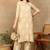 Women beige rayon ethnic motifs embroidered a-line chikankari kurta & palazzo set