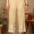 Women beige rayon ethnic motifs embroidered a-line chikankari kurta & palazzo set