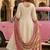 Off-white ethnic printed satin stitched anarkali kurta set with straight pant for women