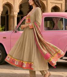 Beige ethnic printed satin stitched anarkali kurta set with straight pant for women