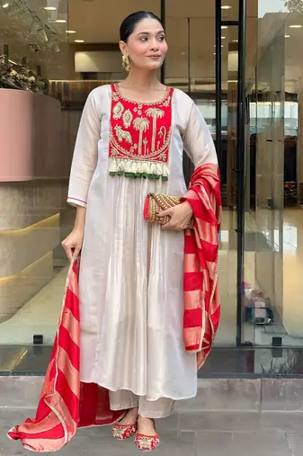 Women cream silk sequin embroidery kurta set with red jacquard silk dupatta salwar suit