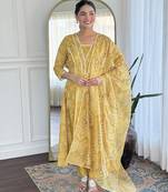 Yellow rayon silk printed u neck kurta set with printed organza pink dupatta