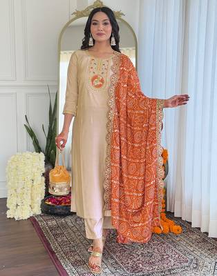 Cream viscose silk sequin embroidered kurta set with orange dupatta 1
