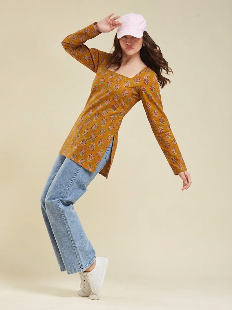 Women's rayon handprinted designer casual wear ethnic orange short kurti