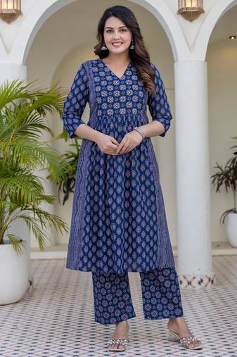 Women blue cotton delicate sequence and moti embellishments on neckline kurta set