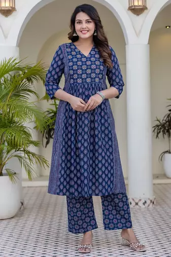 Women blue cotton delicate sequence and moti embellishments on neckline kurta set