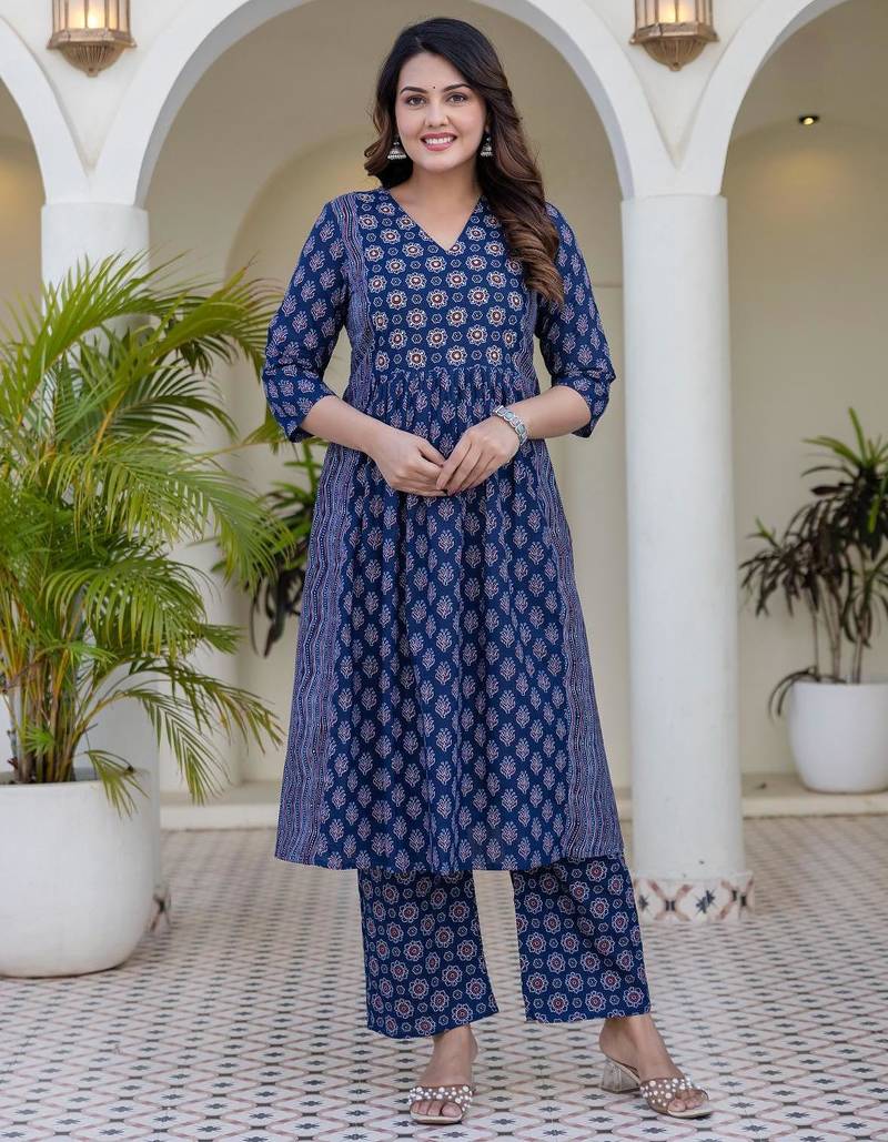 Women blue cotton delicate sequence and moti embellishments on neckline kurta set