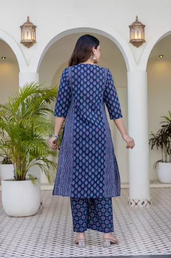 Women blue cotton delicate sequence and moti embellishments on neckline kurta set