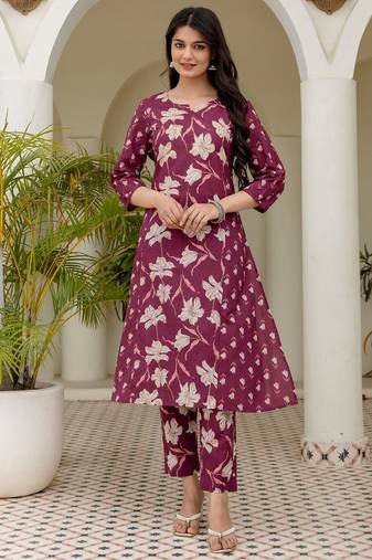 Women plum cotton premium pure cotton, neck has  detailing all work over has side border detailing kurta set
