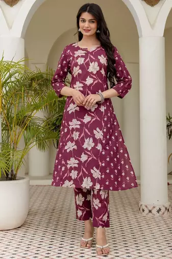 Women plum cotton premium pure cotton, neck has  detailing all work over has side border detailing kurta set
