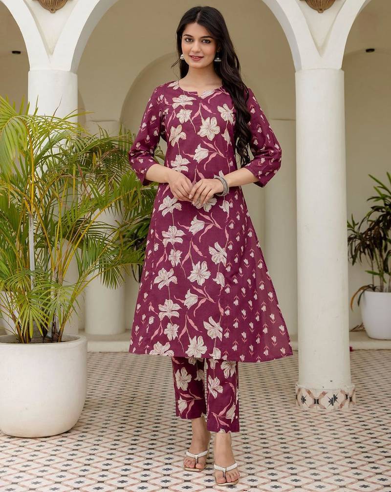 Women plum cotton premium pure cotton, neck has  detailing all work over has side border detailing kurta set