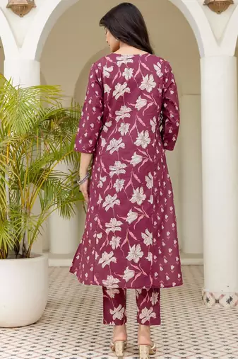 Women plum cotton premium pure cotton neck has detailing all work over has side border detailing kurta set
