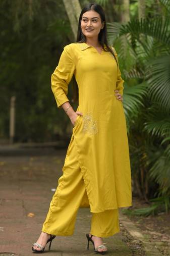 Women yellow premium crystal silk subtle chid and moti cutdana work on the collar and near the hemline kurta set