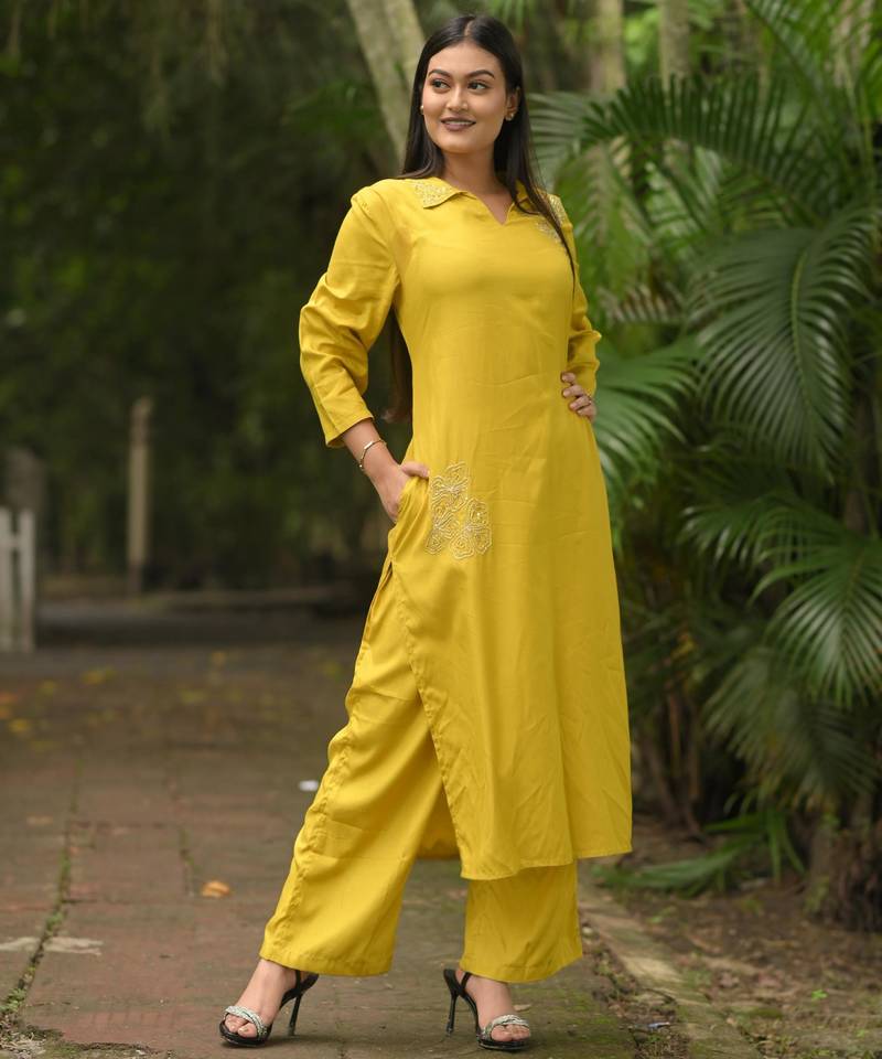 Women yellow premium crystal silk subtle chid and moti cutdana work on the collar and near the hemline kurta set
