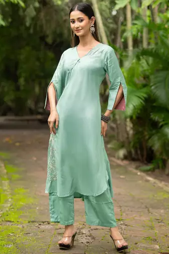 Women sea green premium crystal silk fine hand embroidery thread running stitch work on the neckline and hem, kurta set