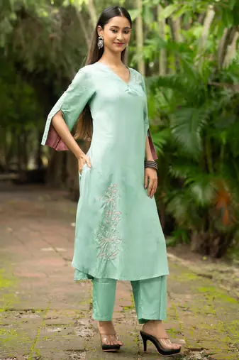 Women sea green premium crystal silk fine hand embroidery thread running stitch work on the neckline and hem kurta set