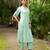 Women sea green premium crystal silk fine hand embroidery thread running stitch work on the neckline and hem, kurta set