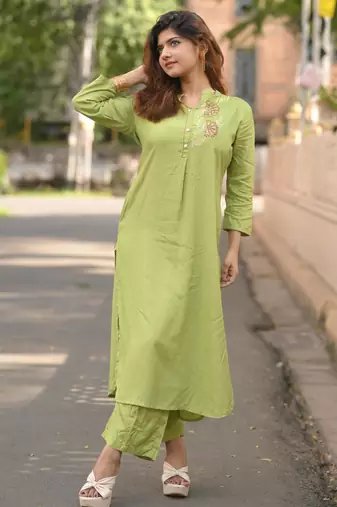 Women green premium crystal silk enhanced with fine sitara and thread work   kurta set