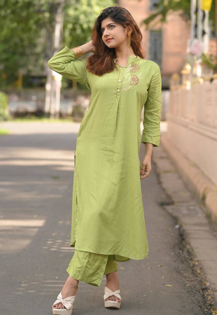 Women green premium crystal silk enhanced with fine sitara and thread work   kurta set