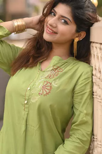 Women green premium crystal silk enhanced with fine sitara and thread work  kurta set