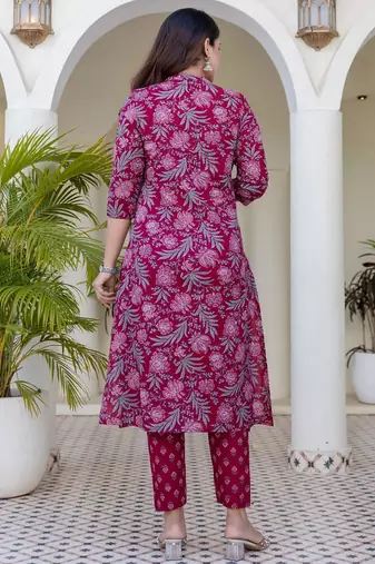 Women magenta cotton delicate sequence and moti embellishments on neckline kurta set