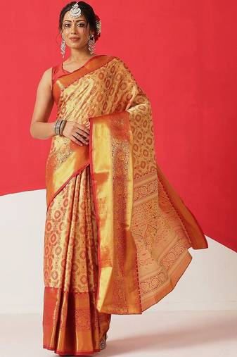 Golden woven silk blend ethnic saree with blouse piece