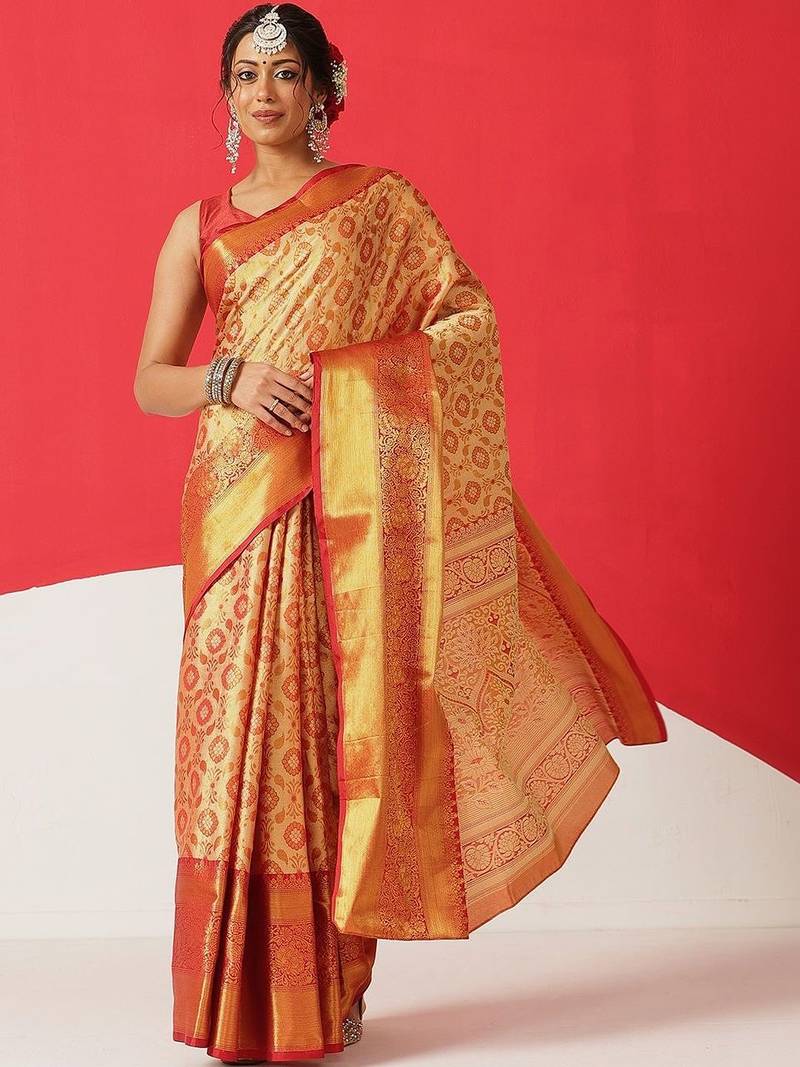 Golden woven silk blend ethnic saree with blouse piece