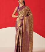 Golden woven silk blend ethnic saree with blouse piece