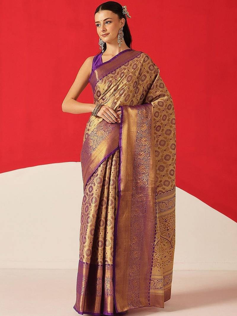 Golden woven silk blend ethnic saree with blouse piece