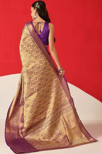 Golden woven silk blend ethnic saree with blouse piece