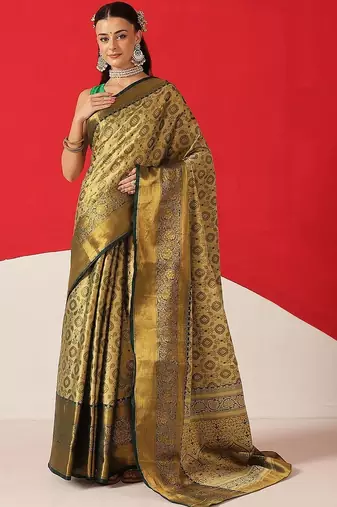 Golden woven silk blend ethnic saree with blouse piece