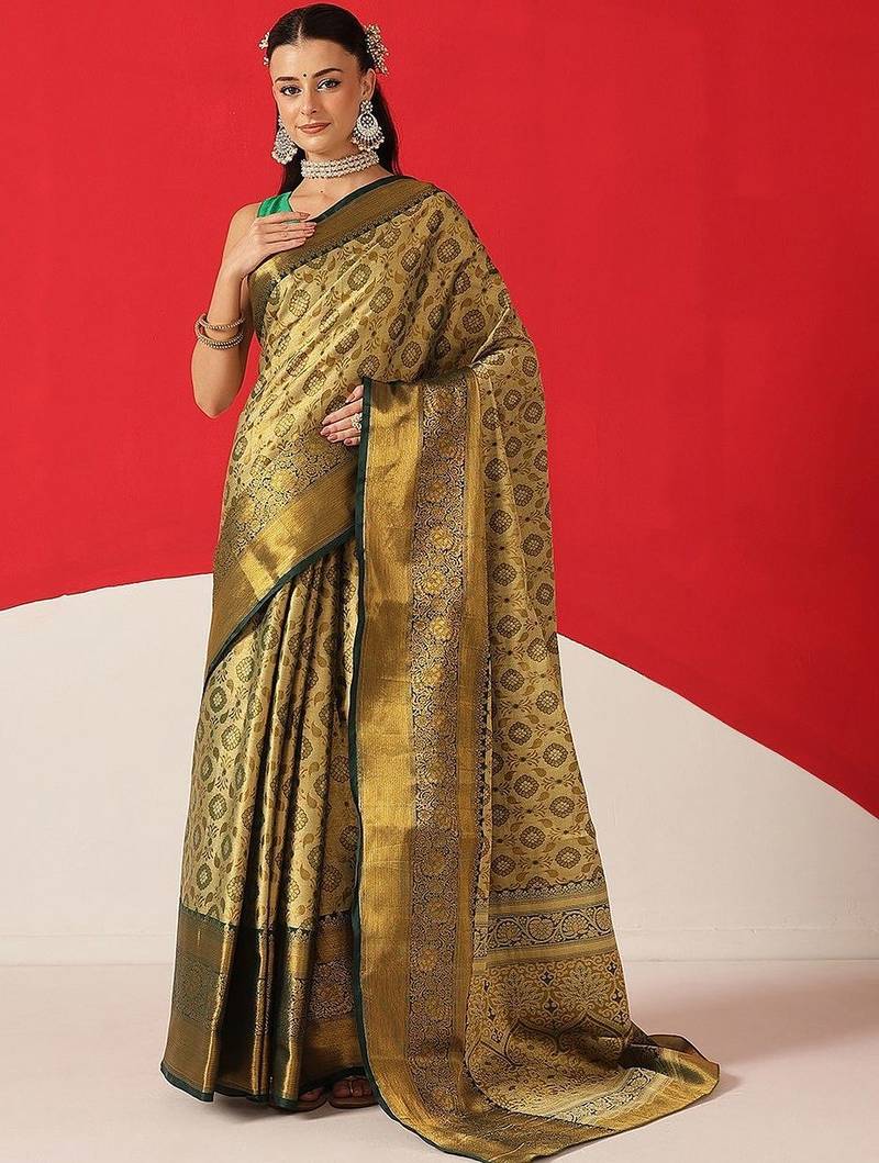 Golden woven silk blend ethnic saree with blouse piece