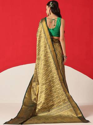 Golden woven silk blend ethnic saree with blouse piece 2