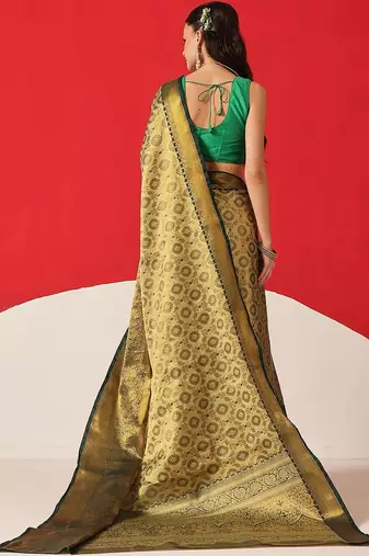 Golden woven silk blend ethnic saree with blouse piece