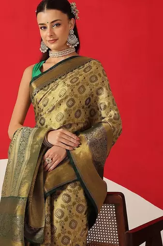 Golden woven silk blend ethnic saree with blouse piece