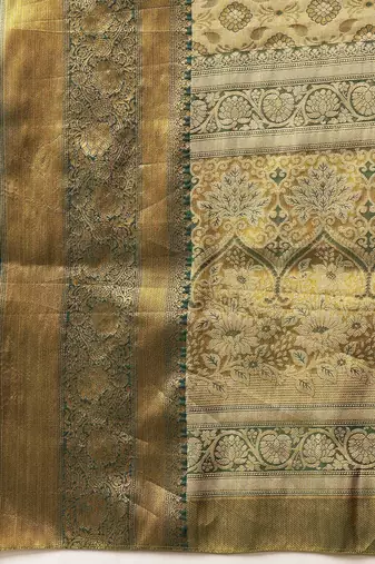 Golden woven silk blend ethnic saree with blouse piece