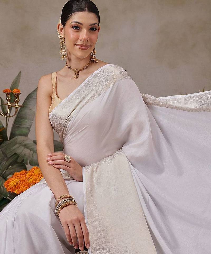 Off white woven silk blend ethnic saree with blouse piece