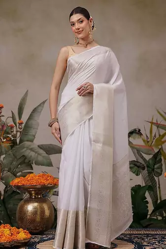 Off white woven silk blend ethnic saree with blouse piece