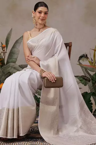 Off white woven silk blend ethnic saree with blouse piece