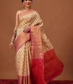 Cream woven art silk traditional saree with blouse piece