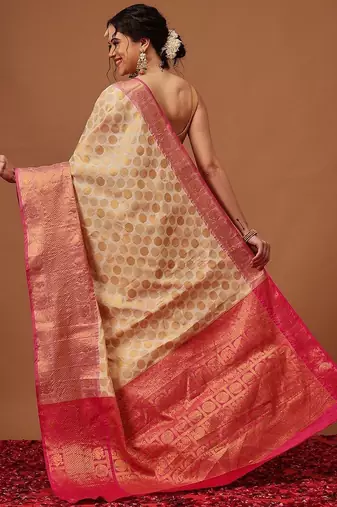 Cream woven art silk traditional saree with blouse piece